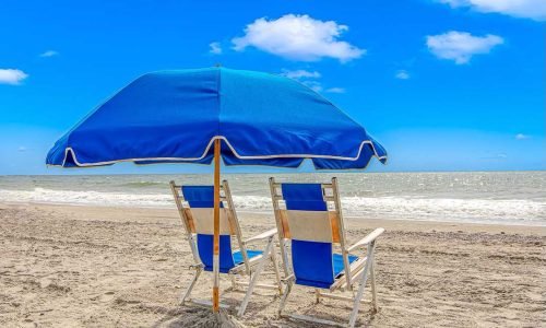 Enjoy complimentary beach chairs when you book directly with Dunes Village Penthouse! Discover the best family-friendly resorts in Myrtle Beach, featuring an Airbnb that sleeps 8, hosted by Jessica Doyle, PMIC.