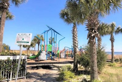 Outdoor jungle gym and kids playground, by the beach available for guests who book our Penthouse vacation rental at Dunes Village