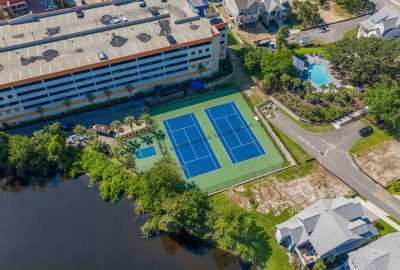 Pristine tennis courts and pickleball amenities available at the penthouse in Dunes Village