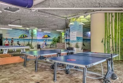 Family vacation at ocean view penthouse Airbnb in Myrtle Beach, South Carolina. Dunes Village Resort features pools, lazy rivers, slides, dining options, and direct beach access
